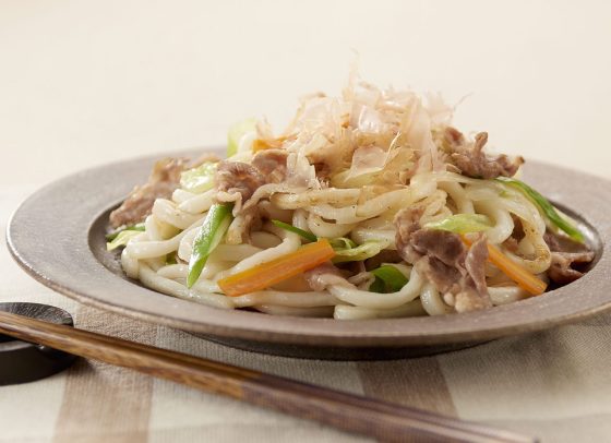 Yaki udon stir-fried noodles with pork and vegetables seasoned with Somi Tsuyu