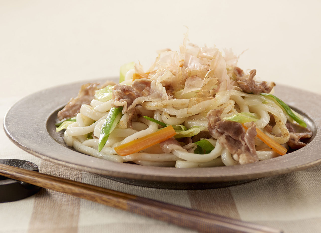 Yaki udon stir-fried noodles with pork and vegetables seasoned with Somi Tsuyu